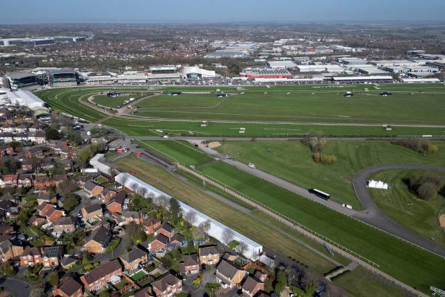 This aerial view shows Aintree Racecourse in Liverpool, north-west England on April 8, 2026. Aintree will host the Grand National horse race on April 11 during the Grand National Festival. (Photo by Oli SCARFF / AFP)