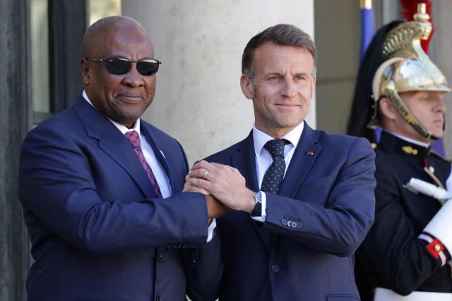 France's President Emmanuel Macron welcomes Ghana’s President John Dramani Mahama (L) for a meeting at The Elysee Presidential Palace in Paris on April 8, 2026. (Photo by Ludovic MARIN / AFP)