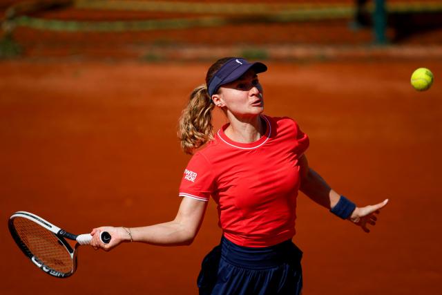 Norway's Malene Helgo returns the ball to France's Elsa Jacquemot during her Billie Jean King Cup play-offs women's singles tennis match in Oeiras, outskirts of Lisbon, on April 8, 2026. (Photo by FILIPE AMORIM / AFP)