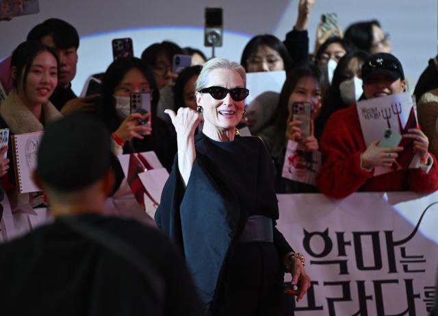 US actress Meryl Streep greets fans during a red carpet event to promote the film "The Devil Wears Prada 2" in Seoul on April 8, 2026. (Photo by Jung Yeon-je / AFP)