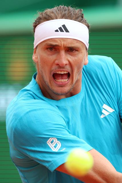 Germany's Alexander Zverev eyes the ball as he plays against Chile's Cristian Garin during the Monte Carlo ATP Masters Series Tournament round of 32 tennis match on Court Rainier III at the Monte-Carlo Country Club in Roquebrune-Cap-Martin, south-eastern France on April 8, 2026. (Photo by Valery HACHE / AFP)