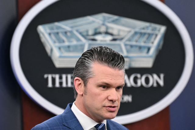 US Secretary of Defense Pete Hegseth speaks during a press briefing at the Pentagon in Washington, DC, on April 8, 2026. The United States and Iran agreed to a two-week ceasefire on April 7 barely an hour before President Donald Trump's deadline to obliterate the country, triggering global relief alongside apprehension. Tehran has agreed to temporarily reopen the Strait of Hormuz, through which much of the world's oil, gas and fertiliser passes, easing concerns for the battered global economy. (Photo by Mandel NGAN / AFP)