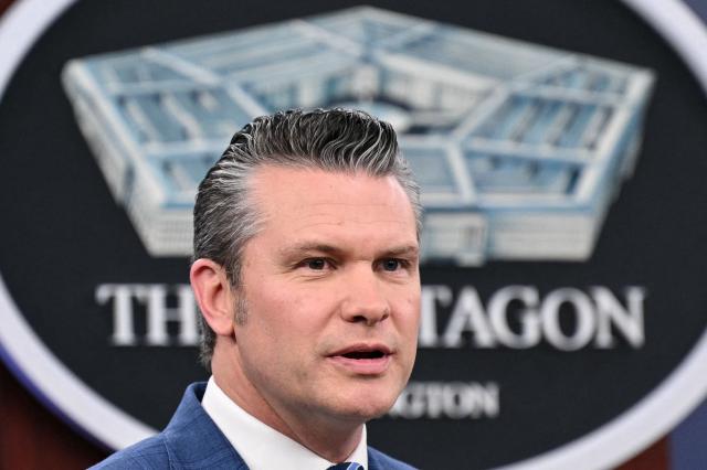 US Secretary of Defense Pete Hegseth speaks during a press briefing at the Pentagon in Washington, DC, on April 8, 2026. The United States and Iran agreed to a two-week ceasefire on April 7 barely an hour before President Donald Trump's deadline to obliterate the country, triggering global relief alongside apprehension. Tehran has agreed to temporarily reopen the Strait of Hormuz, through which much of the world's oil, gas and fertiliser passes, easing concerns for the battered global economy. (Photo by Mandel NGAN / AFP)