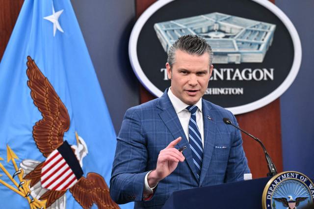 US Secretary of Defense Pete Hegseth speaks during a press briefing at the Pentagon in Washington, DC, on April 8, 2026. The United States and Iran agreed to a two-week ceasefire on April 7 barely an hour before President Donald Trump's deadline to obliterate the country, triggering global relief alongside apprehension. Tehran has agreed to temporarily reopen the Strait of Hormuz, through which much of the world's oil, gas and fertiliser passes, easing concerns for the battered global economy. (Photo by Mandel NGAN / AFP)