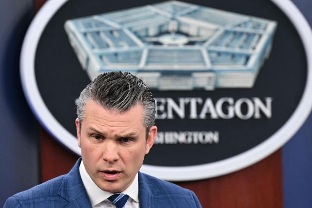 US Secretary of Defense Pete Hegseth speaks during a press briefing at the Pentagon in Washington, DC, on April 8, 2026. The United States and Iran agreed to a two-week ceasefire on April 7 barely an hour before President Donald Trump's deadline to obliterate the country, triggering global relief alongside apprehension. Tehran has agreed to temporarily reopen the Strait of Hormuz, through which much of the world's oil, gas and fertiliser passes, easing concerns for the battered global economy. (Photo by Mandel NGAN / AFP)