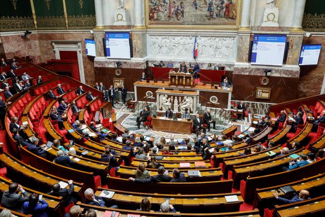MPs attend a session of questions to the government at The National Assembly, France's lower house of parliament in Paris on April 8, 2026. (Photo by GEOFFROY VAN DER HASSELT / AFP)