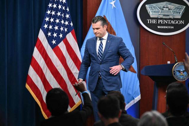 US Secretary of Defense Pete Hegseth departs after speaking during a press briefing at the Pentagon in Washington, DC, on April 8, 2026. The United States and Iran agreed to a two-week ceasefire on April 7 barely an hour before President Donald Trump's deadline to obliterate the country, triggering global relief alongside apprehension. Tehran has agreed to temporarily reopen the Strait of Hormuz, through which much of the world's oil, gas and fertiliser passes, easing concerns for the battered global economy. (Photo by Mandel NGAN / AFP)