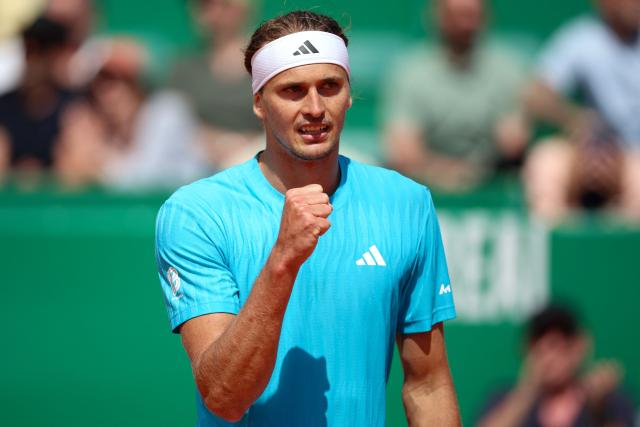 Germany's Alexander Zverev celebrates after winning a game as he plays against Chile's Cristian Garin during the Monte Carlo ATP Masters Series Tournament round of 32 tennis match on Court Rainier III at the Monte-Carlo Country Club in Roquebrune-Cap-Martin, south-eastern France on April 8, 2026. (Photo by Valery HACHE / AFP)