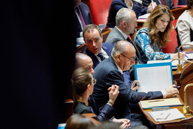 France's Government Spokesperson Maud Bregeon (R), France's junior Minister in charge of parliament relations Laurent Panifous (2R), France's Prime Minister Sebastien Lecornu (C-L), France's Interior Minister Laurent Nunez (C-R) attend a session of questions to the government at The National Assembly, France's lower house of parliament in Paris on April 8, 2026. (Photo by GEOFFROY VAN DER HASSELT / AFP)