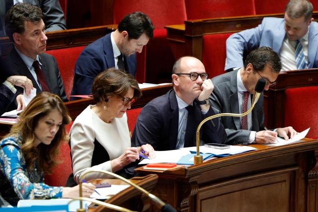 France’s junior Minister for industry Sebastien Martin (3R) looks on during a session of questions to the government at The National Assembly, France's lower house of parliament in Paris on April 8, 2026. (Photo by GEOFFROY VAN DER HASSELT / AFP)