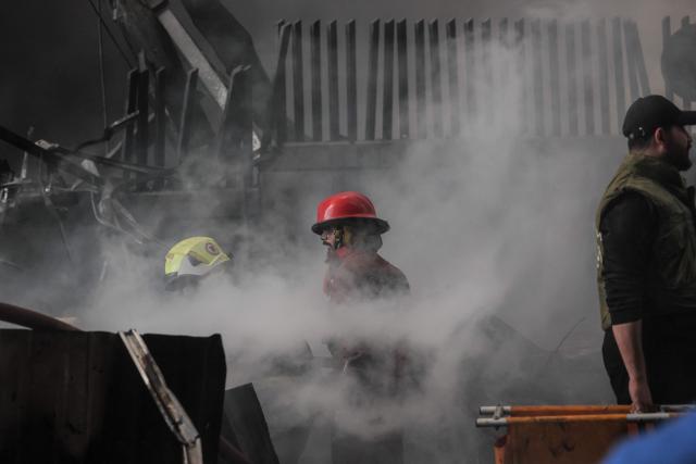 First responders work at the site of an Israeli airstrike in Beirut's Corniche al-Mazraa neighbourhood on April 8, 2026. Israel launched a series of strikes in Beirut on April 8, causing panic among residents in the most violent attack on the capital since the start of the war with Hezbollah. The Israeli military said it carried out its "largest coordinated strike across Lebanon". Israel has insisted the two-week truce in its war with Iran does not apply to Lebanon. (Photo by ibrahim AMRO / AFP)
