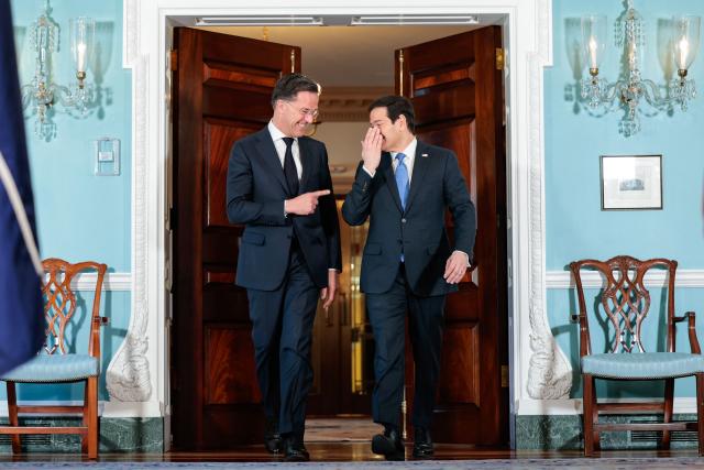 (L/R) NATO Secrertary General Mark Rutte and US Secretary of State Marco Rubio speak with each other as they meet at the State Department in Washington, DC, on April 8, 2026. Rutte has a scheduled meeting with US President Donald Trump later in the day at the White House. (Photo by Kent Nishimura / AFP)