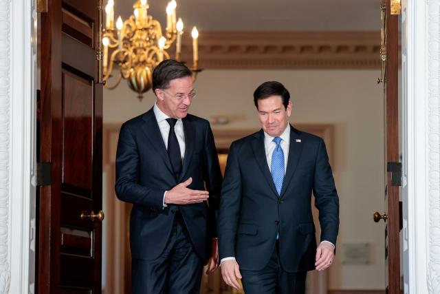 (L/R) NATO Secrertary General Mark Rutte and US Secretary of State Marco Rubio speak with each other as they meet at the State Department in Washington, DC, on April 8, 2026. Rutte has a scheduled meeting with US President Donald Trump later in the day at the White House. (Photo by Kent Nishimura / AFP)