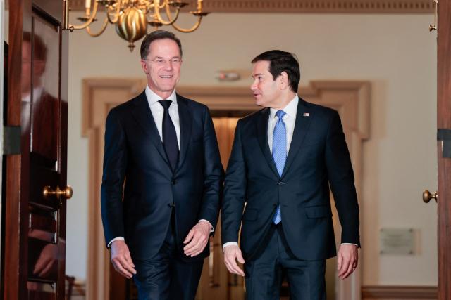(L/R) NATO Secrertary General Mark Rutte and US Secretary of State Marco Rubio speak with each other as they meet at the State Department in Washington, DC, on April 8, 2026. Rutte has a scheduled meeting with US President Donald Trump later in the day at the White House. (Photo by Kent Nishimura / AFP)