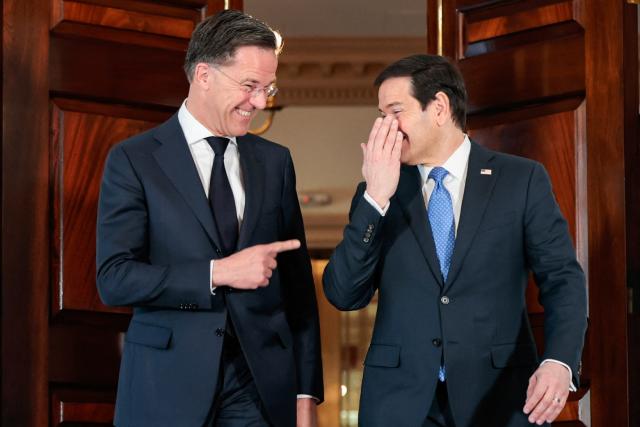 TOPSHOT - (L/R) NATO Secrertary General Mark Rutte and US Secretary of State Marco Rubio speak with each other as they meet at the State Department in Washington, DC, on April 8, 2026. Rutte has a scheduled meeting with US President Donald Trump later in the day at the White House. (Photo by Kent Nishimura / AFP)