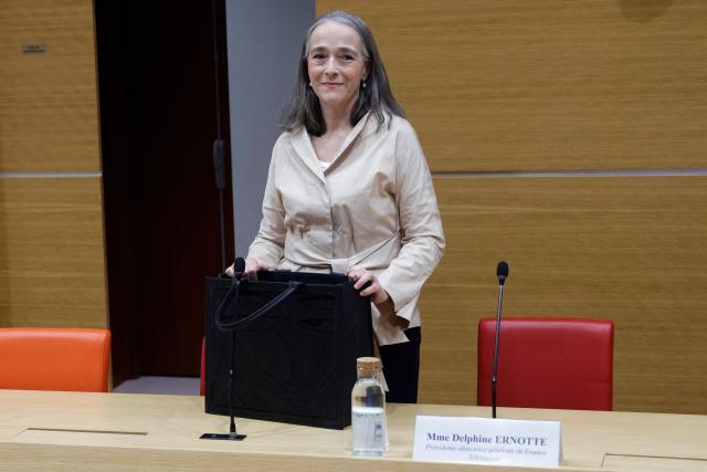 France TV CEO Delphine Ernotte arrives at a hearing by the commission of inquiry into the neutrality, operation and funding of public broadcasting at the National Assembly, France's lower house parliament, on April 8, 2026. (Photo by GEOFFROY VAN DER HASSELT / AFP)