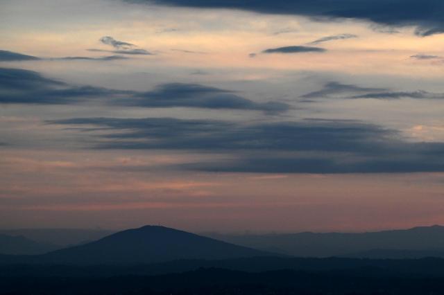 General views of the mountains during sunrise in San Salvador, on March 8, 2026. (Photo by Marvin RECINOS / AFP)