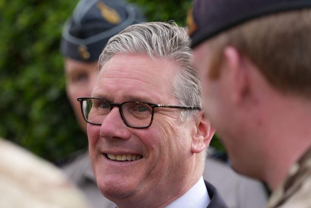Britain's Prime Minister Keir Starmer meets aircrew members during a visit to Taif Airbase, Saudi Arabia, on April 8, 2026. British Prime Minister Keir Starmer arrived on April 9 in Saudi Arabia, on the first stop of a Gulf tour aimed at bolstering the ceasefire in the Middle East war, Downing Street said. (Photo by Alastair Grant / POOL / AFP)