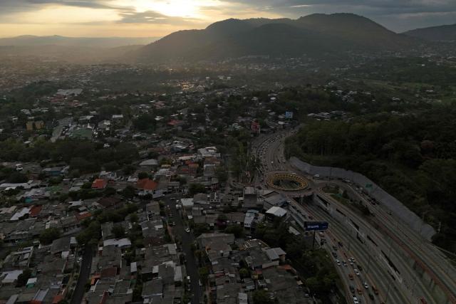 Aerial view of the city of San Salvador during sunrise, on April 8, 2026. (Photo by Marvin RECINOS / AFP)