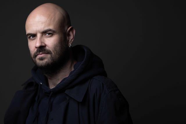 (FILES) Director of the Odeon Theatre, Julien Gosselin, poses during a photo session in Paris on May 23, 2025. The Avignon festival intends to introduce Korean live performance, little known in Europe, this year through the language of that country, according to the organizers. Julien Gosselin, an emblematic figure of the festival, will open this edition in the Cour d'honneur of the Palais des Papes with "Maldoror," a five-hour spectacle. The 80th edition of this international theatre event, which will be held from July 4 to 25, includes 47 shows (nearly 300 performances), including 30 new creations, according to its director, who unveiled his program on April 8, 2026, on site and simultaneously on the festival's social networks. (Photo by JOEL SAGET / AFP)