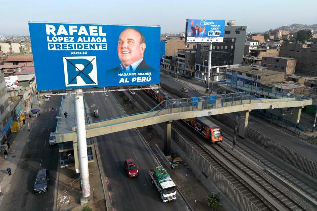 Aerial view of political propaganda of presidential candidate Rafael Lopez Aliaga for the  Popular Renewal, in Lima, on April 8, 2026. Peruvians will choose from a bewildering array of 35 presidential candidates on April 12, 2026, electing the next leader of an Andean nation beset by crime and a string of short-lived, scandal tainted presidencies. (Photo by Luis ROBAYO / AFP)