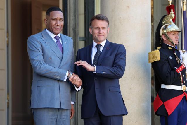 President of Botswana Duma Boko (L) is welcomed by French President Emmanuel Macron (2ndR) prior to their meeting at the Elysee Palace in Paris on April 8, 2026. (Photo by Ludovic MARIN / AFP)
