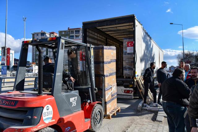 Medical supplies prepared by the Turkish Health Ministry are loaded onto trucks before departing for Iran in Van, north-eastern Turkey, on April 8, 2026. Three trucks loaded with humanitarian aid are scheduled to enter Iran on April 8, 2026 from Turkey, announced Turkish Health Minister Kemal Memisoglu. (Photo by Ali IHSAN OZTURK / AFP)