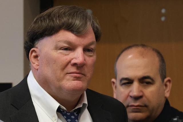 Rex Heuermann (L) pleads guilty in connection with the Gilgo Beach serial killings during a hearing at Suffolk County Court in Riverhead, New York on April 8, 2026. The Gilgo Beach serial killings refer to a series of murders discovered on Long Island in 2010–2011, with Rex Heuermann arrested in 2023 and charged in several of the killings. (Photo by James Carbone / POOL / AFP)