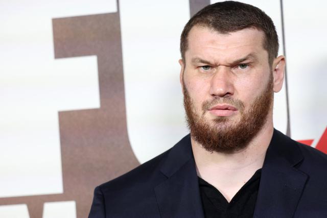 Russia's Arslanbek Makhmudov arrives on the red carpet to attend a "Grand Arrival" event in central London on April 8, 2026, ahead of the heavyweight boxing match with Britain's two-time former world heavyweight champion Tyson Fury and on April 11. (Photo by Toby Shepheard / AFP)