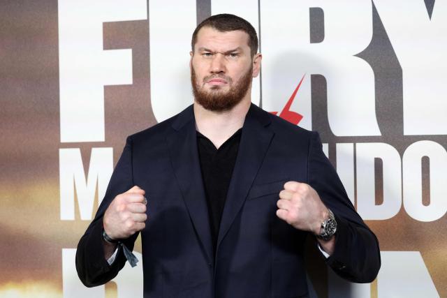 Russia's Arslanbek Makhmudov arrives on the red carpet to attend a "Grand Arrival" event in central London on April 8, 2026, ahead of the heavyweight boxing match with Britain's two-time former world heavyweight champion Tyson Fury and on April 11. (Photo by Toby Shepheard / AFP)