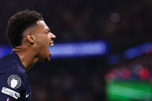 Paris Saint-Germain's French midfielder #14 Desire Doue celebrates after scoring the opening goal during the UEFA Champions League quarter-final first leg football match between Paris Saint-Germain (PSG) and Liverpool FC at the Parc des Princes stadium in Paris on April 8, 2026. (Photo by FRANCK FIFE / AFP)