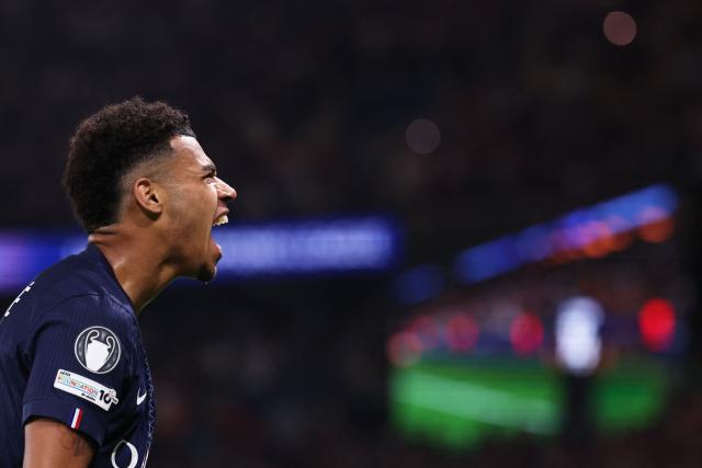 Paris Saint-Germain's French midfielder #14 Desire Doue  celebrates  after scoring the opening goal during the UEFA Champions League quarter-final first leg football match between Paris Saint-Germain (PSG) and Liverpool FC at the Parc des Princes stadium in Paris on April 8, 2026. (Photo by FRANCK FIFE / AFP)