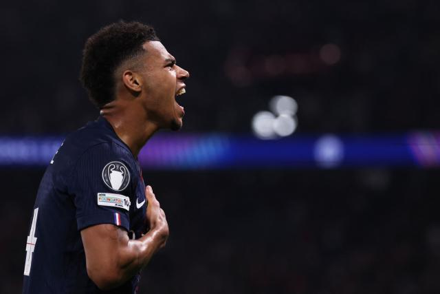 Paris Saint-Germain's French midfielder #14 Desire Doue celebrates after scoring the opening goal during the UEFA Champions League quarter-final first leg football match between Paris Saint-Germain (PSG) and Liverpool FC at the Parc des Princes stadium in Paris on April 8, 2026. (Photo by FRANCK FIFE / AFP)