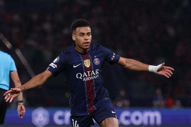 Paris Saint-Germain's French midfielder #14 Desire Doue celebrates after scoring the opening goal during the UEFA Champions League quarter-final first leg football match between Paris Saint-Germain (PSG) and Liverpool FC at the Parc des Princes stadium in Paris on April 8, 2026. (Photo by FRANCK FIFE / AFP)