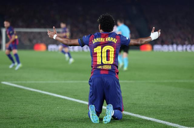Barcelona's Spanish forward #10 Lamine Yamal reacts during the UEFA Champions League quarter final first leg football match between FC Barcelona and Club Atletico de Madrid at Camp Nou Stadium in Barcelona on April 8, 2026. (Photo by Josep LAGO / AFP)