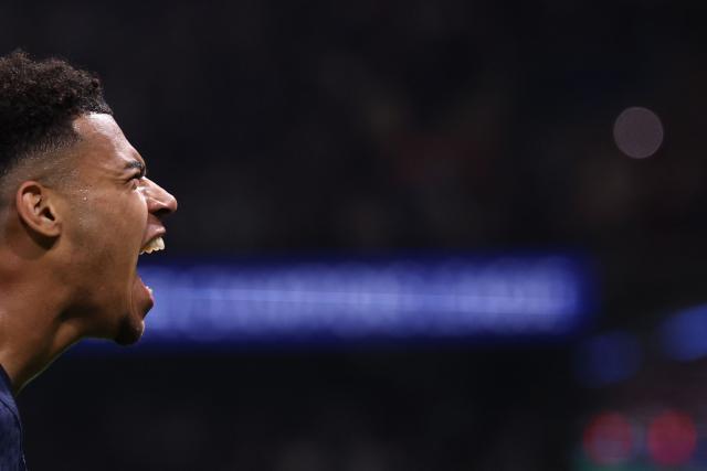 Paris Saint-Germain's French midfielder #14 Desire Doue   celebrates after scoring the opening goal during the UEFA Champions League quarter-final first leg football match between Paris Saint-Germain (PSG) and Liverpool FC at the Parc des Princes stadium in Paris on April 8, 2026. (Photo by FRANCK FIFE / AFP)