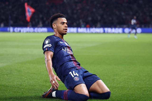 Paris Saint-Germain's French midfielder #14 Desire Doue   celebrates after scoring the opening goal during the UEFA Champions League quarter-final first leg football match between Paris Saint-Germain (PSG) and Liverpool FC at the Parc des Princes stadium in Paris on April 8, 2026. (Photo by FRANCK FIFE / AFP)