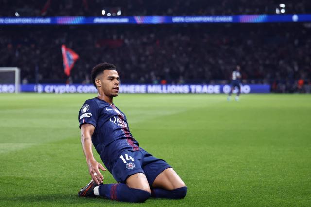 Paris Saint-Germain's French midfielder #14 Desire Doue   celebrates after scoring the opening goal during the UEFA Champions League quarter-final first leg football match between Paris Saint-Germain (PSG) and Liverpool FC at the Parc des Princes stadium in Paris on April 8, 2026. (Photo by FRANCK FIFE / AFP)