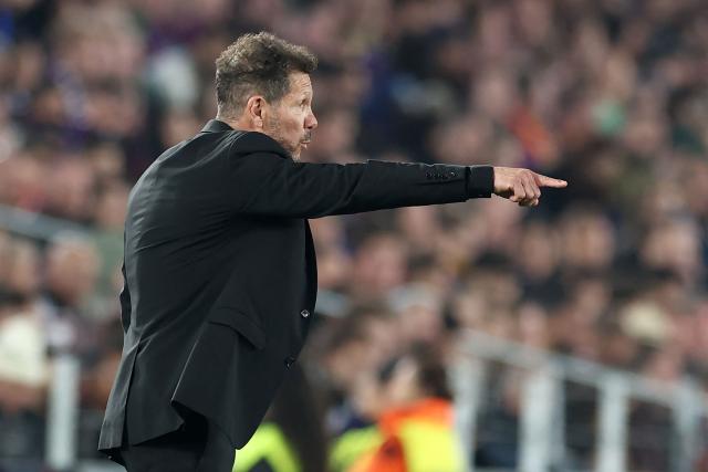 Atletico Madrid's Argentine coach Diego Simeone gestures on the touchline during the UEFA Champions League quarter final first leg football match between FC Barcelona and Club Atletico de Madrid at Camp Nou Stadium in Barcelona on April 8, 2026. (Photo by Josep LAGO / AFP)