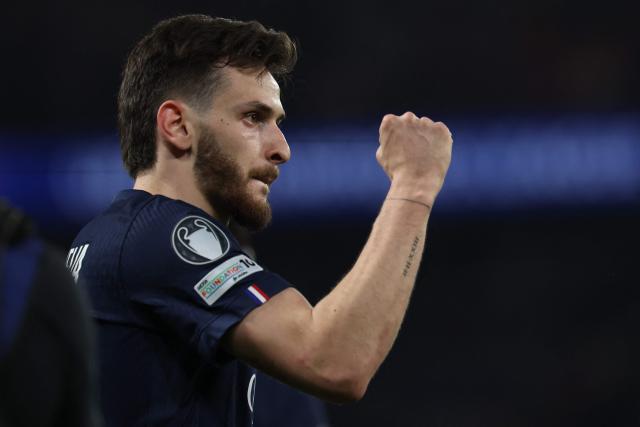 Paris Saint-Germain's Georgian forward #07 Khvicha Kvaratskhelia celebrates scoring his team's second goal during the UEFA Champions League quarter-final first leg football match between Paris Saint-Germain (PSG) and Liverpool FC at the Parc des Princes stadium in Paris on April 8, 2026. (Photo by Anne-Christine POUJOULAT / AFP)