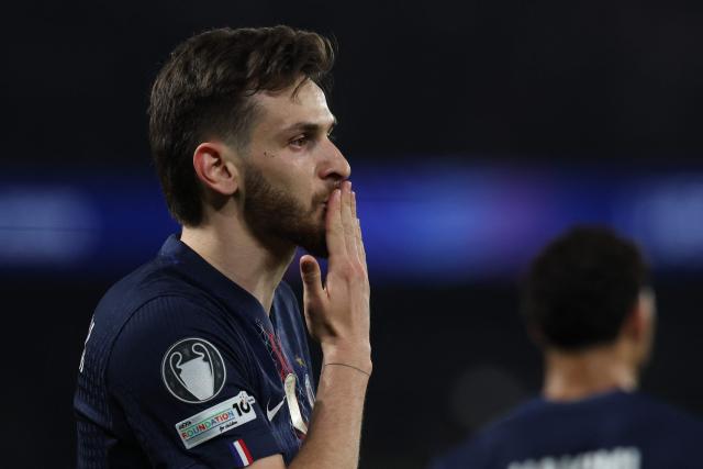 Paris Saint-Germain's Georgian forward #07 Khvicha Kvaratskhelia celebrates scoring his team's second goal during the UEFA Champions League quarter-final first leg football match between Paris Saint-Germain (PSG) and Liverpool FC at the Parc des Princes stadium in Paris on April 8, 2026. (Photo by Anne-Christine POUJOULAT / AFP)