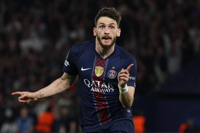 Paris Saint-Germain's Georgian forward #07 Khvicha Kvaratskhelia celebrates scoring his team's second goal during the UEFA Champions League quarter-final first leg football match between Paris Saint-Germain (PSG) and Liverpool FC at the Parc des Princes stadium in Paris on April 8, 2026. (Photo by Anne-Christine POUJOULAT / AFP)