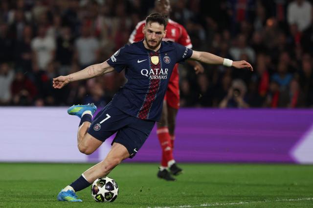 Paris Saint-Germain's Georgian forward #07 Khvicha Kvaratskhelia scores his team's second goal during the UEFA Champions League quarter-final first leg football match between Paris Saint-Germain (PSG) and Liverpool FC at the Parc des Princes stadium in Paris on April 8, 2026. (Photo by Anne-Christine POUJOULAT / AFP)