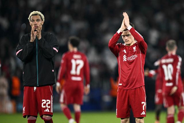 Liverpool's German midfielder #07 Florian Wirtz (R) reacts at the end of the UEFA Champions League quarter-final first leg football match between Paris Saint-Germain (PSG) and Liverpool FC at the Parc des Princes stadium in Paris on April 8, 2026. (Photo by JULIEN DE ROSA / AFP)
