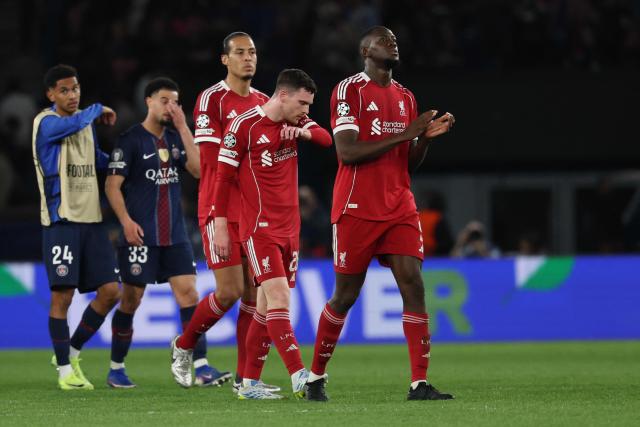 Liverpool's players react at the end of the UEFA Champions League quarter-final first leg football match between Paris Saint-Germain (PSG) and Liverpool FC at the Parc des Princes stadium in Paris on April 8, 2026. (Photo by Anne-Christine POUJOULAT / AFP)