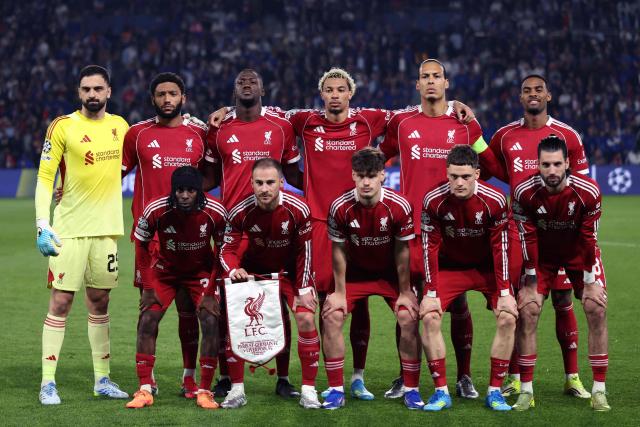 (Top, L-R) Liverpool's Georgian goalkeeper #25 Giorgi Mamardashvili, Liverpool's English defender #02 Joe Gomez, Liverpool's French defender #05 Ibrahima Konate, Liverpool's French striker #22 Hugo Ekitike, Liverpool's Dutch defender #04 Virgil van Dijk, Liverpool's Dutch midfielder #38 Ryan Gravenberch, (Bottom, L-R) Liverpool's Dutch defender #30 Jeremie Frimpong, Liverpool's Argentinian midfielder #10 Alexis Mac Allister, Liverpool's Hungarian defender #06 Milos Kerkez, Liverpool's German midfielder #07 Florian Wirtz and Liverpool's Hungarian midfielder #08 Dominik Szoboszlai pose prior to the UEFA Champions League quarter-final first leg football match between Paris Saint-Germain (PSG) and Liverpool FC at the Parc des Princes stadium in Paris on April 8, 2026. (Photo by FRANCK FIFE / AFP)