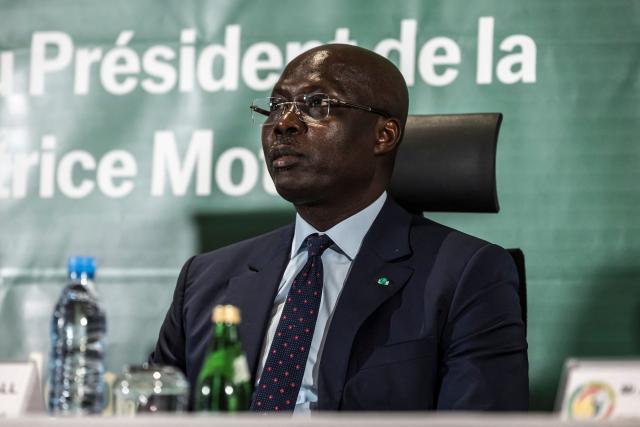 President of the Senegalese Football Federation (SFS) Abdoulaye Fall looks on during a press conference at the Pullman Hotel in Dakar on April 8, 2026. The president of the Confederation of African Football (CAF) was in Dakar Wednesday, nearly a month after the body's shock decision to strip Senegal of its AFCON title and award it to Morocco. (Photo by PATRICK MEINHARDT / AFP)