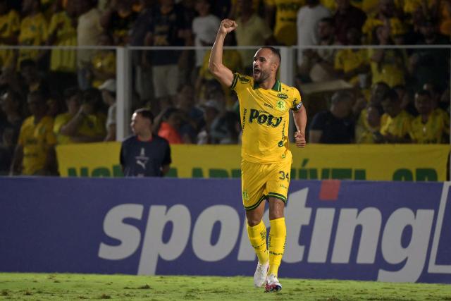Mirassol's defender #34 Joao Victor celebrates after scoring his team's first goal during the Copa Libertadores group stage football match between Brazil's Mirassol and Argentina's Lanus at the Jose Maria de Campos Maia stadium in Mirassol, state of Sao Paulo, Brazil, on April 8, 2026. (Photo by NELSON ALMEIDA / AFP)