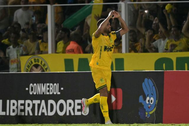 Mirassol's defender #34 Joao Victor celebrates after scoring his team's first goal during the Copa Libertadores group stage football match between Brazil's Mirassol and Argentina's Lanus at the Jose Maria de Campos Maia stadium in Mirassol, state of Sao Paulo, Brazil, on April 8, 2026. (Photo by NELSON ALMEIDA / AFP)