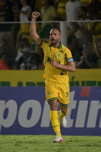 Mirassol's defender #34 Joao Victor celebrates after scoring his team's first goal during the Copa Libertadores group stage football match between Brazil's Mirassol and Argentina's Lanus at the Jose Maria de Campos Maia stadium in Mirassol, state of Sao Paulo, Brazil, on April 8, 2026. (Photo by NELSON ALMEIDA / AFP)
